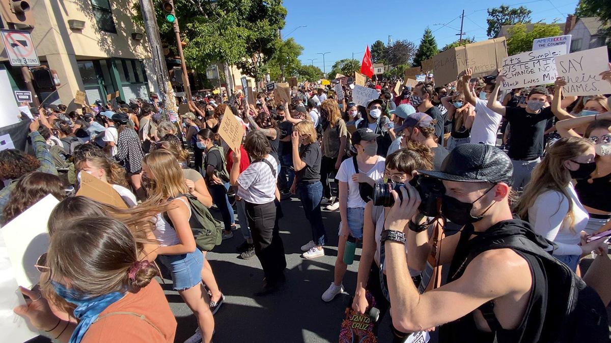 Cameron shooting at a protest