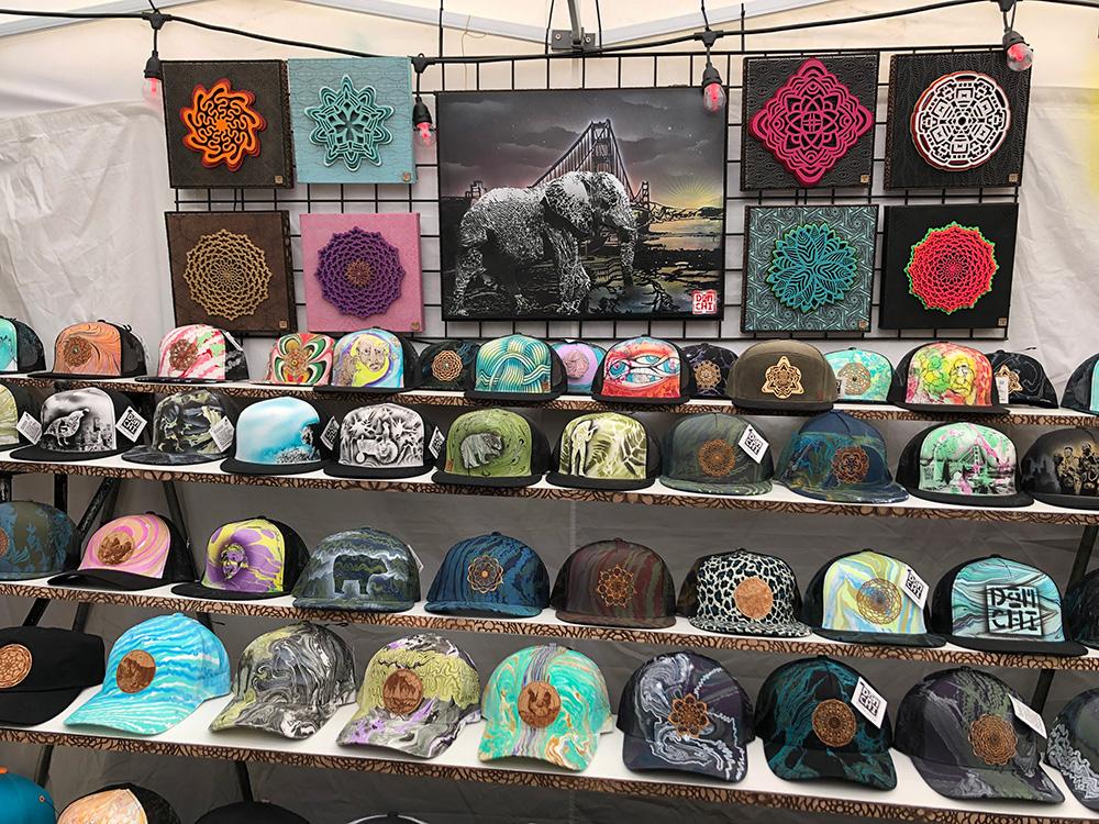 Dom's hand-marbled hats and laser cut art