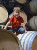 Kalen climbing the barrels