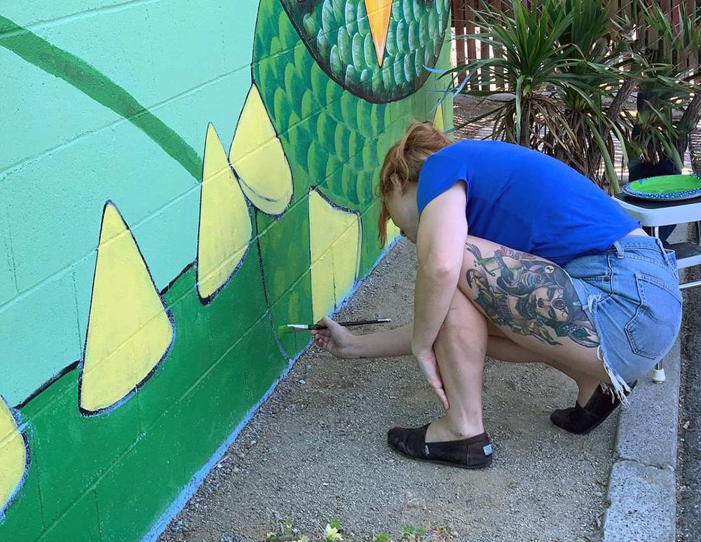 Lauren working on a mural